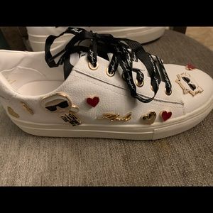 Brand new sneakers very cute just to small and can’t return.